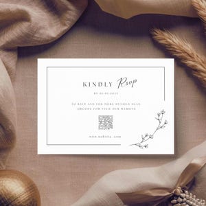 May include: A white RSVP card with black text and a delicate floral illustration. The card includes the words "KINDLY RSVP" and "BY 01.01.2025". It also features a QR code and website address for more details.