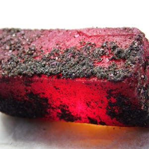 May include: A set of three ceramic mugs with a speckled, matte finish. Each mug features a different color: light blue, cream, and gray. The mugs have a simple, modern design and a comfortable handle. Perfect for coffee or tea.