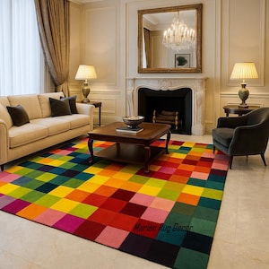 May include: A vibrant, multi-coloured rug with a geometric design of squares in shades of red, yellow, green, and blue. The rug is in a living room with a sofa, armchair, and coffee table. The rug's dimensions are not visible.