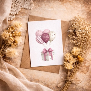 May include: A greeting card featuring a watercolor illustration of balloons and a gift box. The balloons are pink and purple with heart and stripe patterns. The gift box is white with pink hearts and a pink bow. The card has the text "Ivanka Art Design".