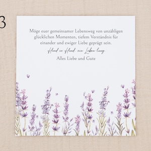 May include: A square white card featuring a watercolor illustration of purple lavender sprigs along the bottom edge. The text reads: M&ouml;ge euer gemeinsamer Lebensweg von unz&auml;hligen gl&uuml;cklichen Momenten, tiefem Verst&auml;ndnis f&uuml;r einander und ewiger Liebe gepr&auml;gt sein. Hand in Hand, ein Leben lang. Alles Liebe und Gute.