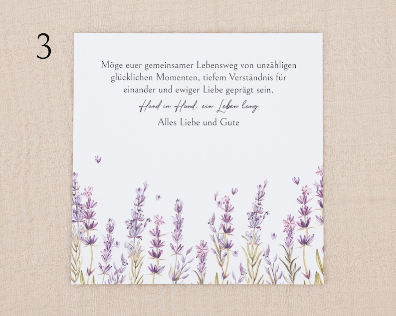 May include: A square white card featuring a watercolor illustration of purple lavender sprigs along the bottom edge. The text reads: M&ouml;ge euer gemeinsamer Lebensweg von unz&auml;hligen gl&uuml;cklichen Momenten, tiefem Verst&auml;ndnis f&uuml;r einander und ewiger Liebe gepr&auml;gt sein. Hand in Hand, ein Leben lang. Alles Liebe und Gute.