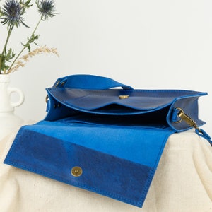 blue leather crossbody bag