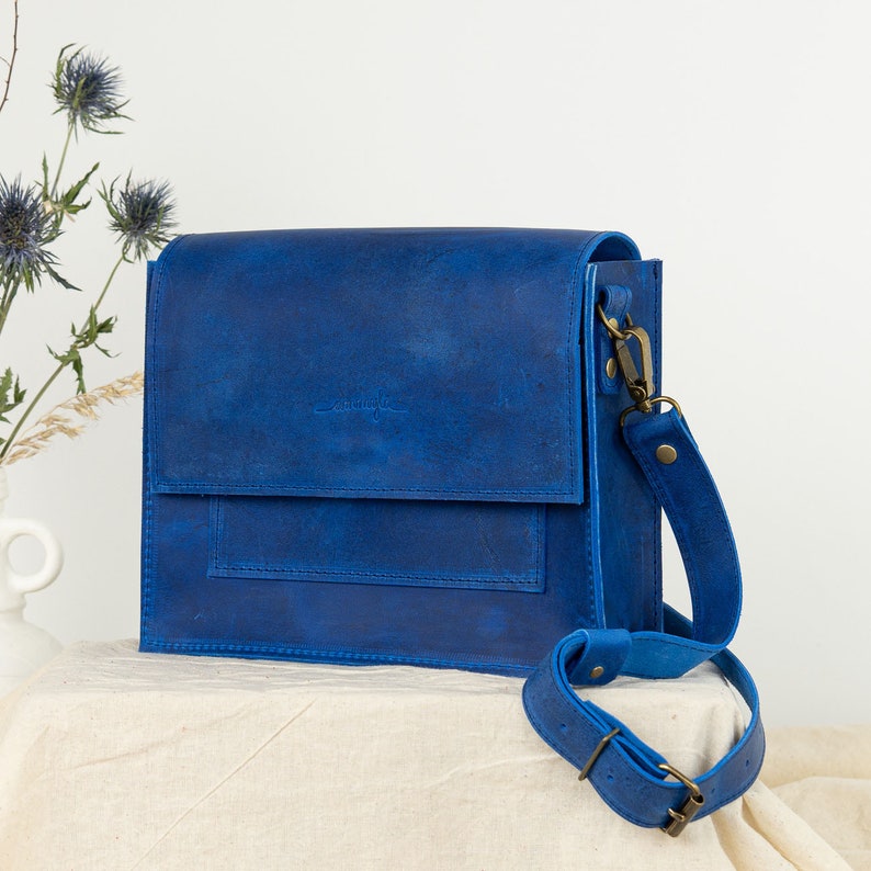 blue leather crossbody bag