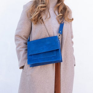 blue leather crossbody bag