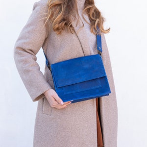 blue leather crossbody bag