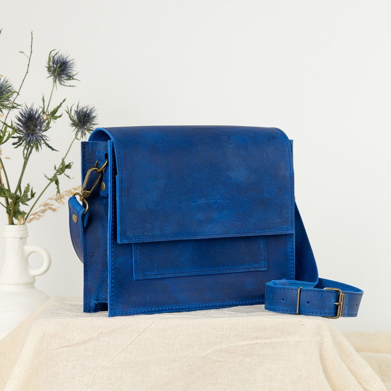 blue leather crossbody bag