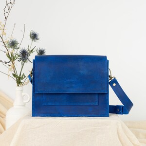 blue leather crossbody bag