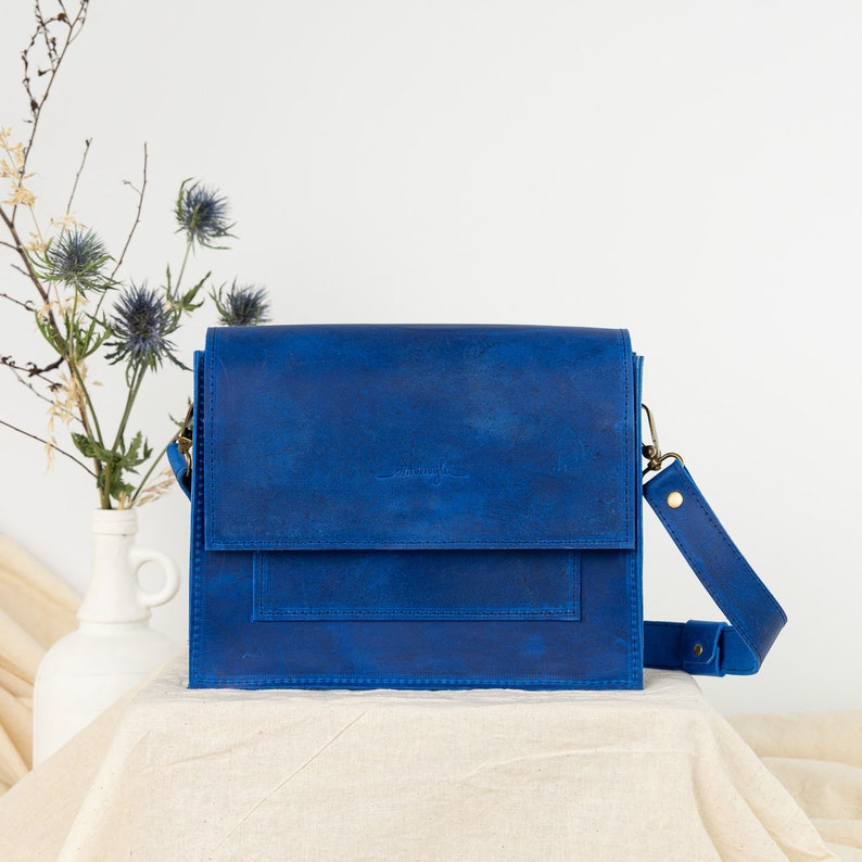 blue leather crossbody bag