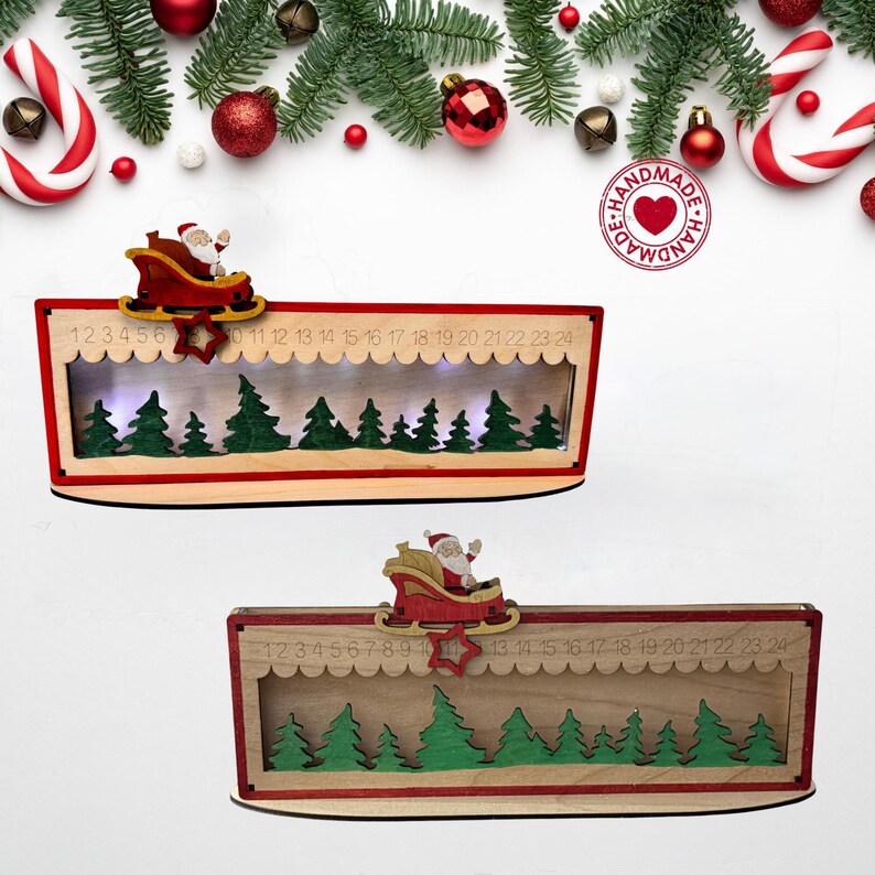May include: Two rectangular wooden Christmas advent calendars featuring a sliding red star marker to track days one through twenty-four. Each calendar displays a cutout scene of green pine trees and a wooden Santa Claus in a red sleigh on top.