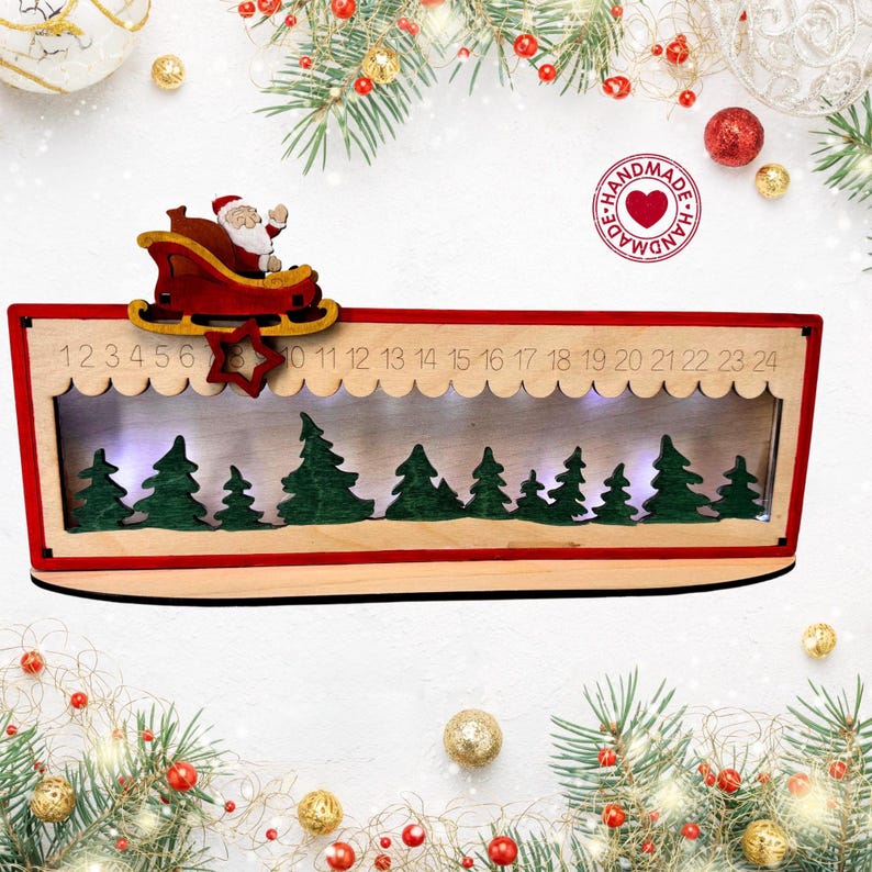 May include: A wooden Christmas advent calendar featuring a red frame and a cutout of Santa Claus in a sleigh. The calendar displays numbers 1 through 24 along the top edge, with a row of green painted pine trees inside and integrated LED lights.