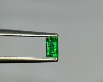 Natural Emerald baguette Arabic words in front Cut Gemstone: 0.29  Carat Green Luster