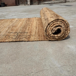 May include: A set of three ceramic nesting bowls in shades of blue, green, and white. The bowls feature a speckled glaze and a simple, modern design. The largest bowl is approximately 7 inches in diameter.