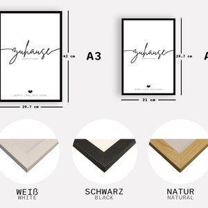 May include: Two framed art prints, A3 size at 29.7 cm x 42 cm and A4 size at 21 cm x 29.7 cm, with the word "zuhause" in script. Below the word is a list of names and a heart symbol. The frames are available in white, black, and natural wood.