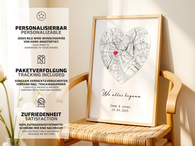 May include: A framed print featuring a heart-shaped map with a red heart marking a location. The print includes the text "Wo alles begann" and names with a date. The print is displayed on a wooden chair.