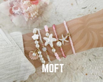 Conjunto de pulseiras rosa com miçangas, pingentes de pérola, concha e estrela-do-mar, joias boho.