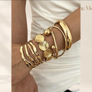 Gold-Tone Stacking Bracelet Set with Hammered Discs and Asymmetrical Bangles