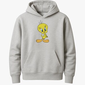 May include: A light gray hoodie featuring a large graphic of Tweety Bird. The cartoon character is yellow with blue eyes and orange feet. The hoodie has a kangaroo pocket and a drawstring hood.