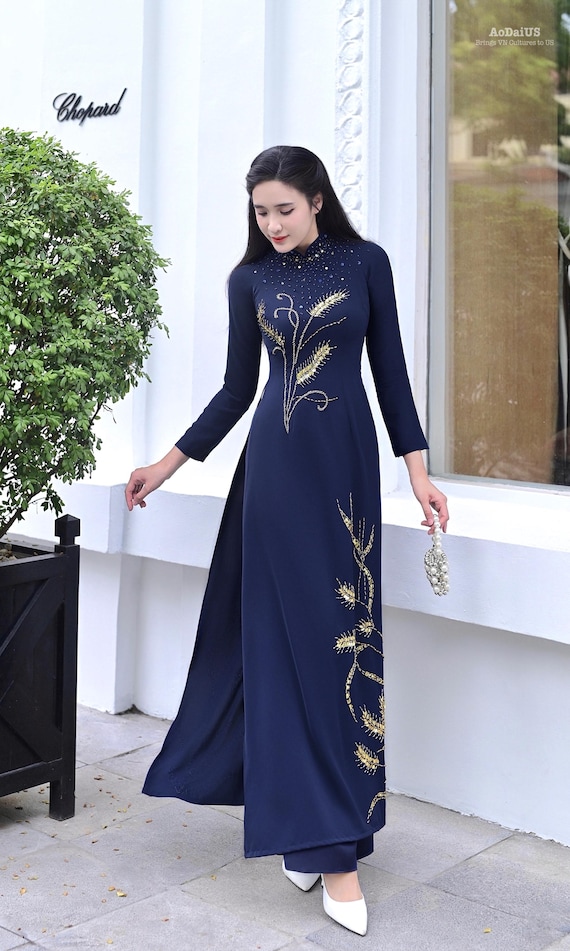 blue dress with gold embroidery Golden Wheat Ao Dai | Vietnamese Traditional navy dress with gold accessories