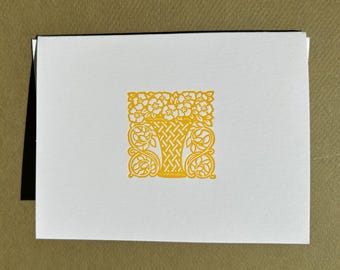 woodcut vase with bouquet, yellow