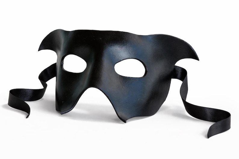 handmade black leather Halloween mask with ribbon ties shown in a clean 3/4 view on a white background