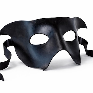 handmade black leather masquerade mask with ribbon ties shown in a clean 3/4 view on a white background