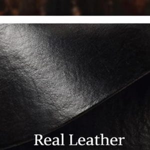close up detail of the painted leather which is part of the hand-made Halloween mask