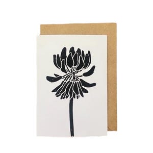 Tarjeta plegable en linóleo con forma de flor