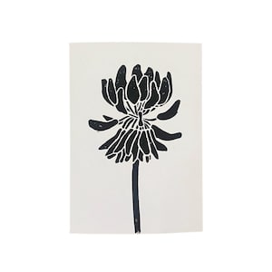 Tarjeta plegable en linóleo con forma de flor