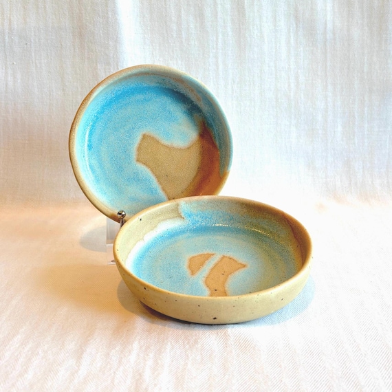 Signed studio pottery sold as a set — real turquoise stoneware from an actual ceramicist, the kind of piece you'd find in a gallery shop.