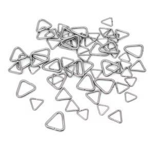 May include: A collection of small, silver-coloured metal triangle rings scattered on a white surface. The rings are uniform in size and shape, with a smooth, metallic finish. These hardware components are suitable for various crafting and jewellery-making projects.