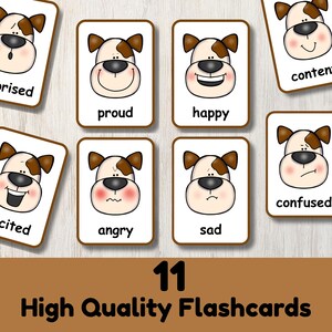 Op de afbeelding: Set van 11 hoogwaardige flashcards met cartoonhonden die verschillende emoties uitdrukken. Elke kaart heeft een witte achtergrond, een bruine rand en een honden gezicht met een andere uitdrukking en de naam van de emotie.