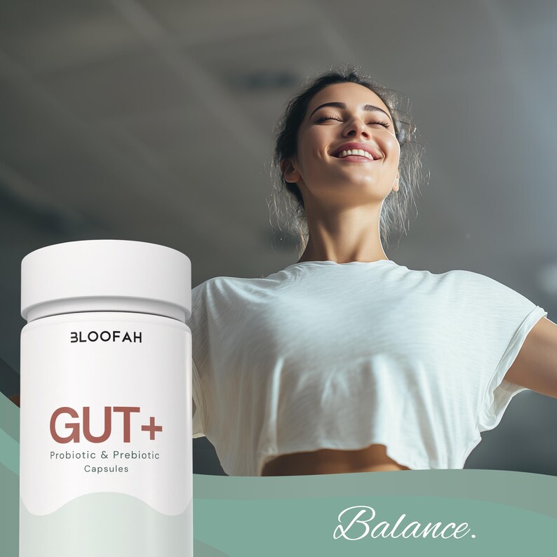 May include: A white bottle of "BLOFAH GUT+" Probiotic & Prebiotic Capsules. The bottle is next to a person wearing a white t-shirt with their arms outstretched and eyes closed. The word "Balance" is written in cursive at the bottom.