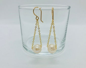 Pearl dangle earrings on chain