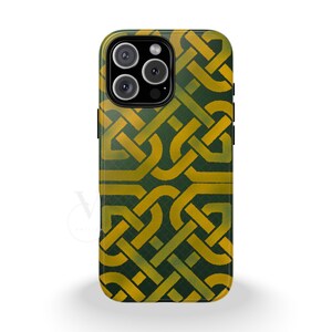 May include: A smartphone case with a green and gold Celtic knot design. The case has a glossy finish and features a repeating pattern of interwoven lines. The camera lenses are visible at the top.