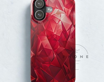 May include: A red phone case with a geometric, faceted design. The case has a glossy finish and a clear border. The phone case has a dual-lens camera cutout. The text "PHONE" is visible on the lower right corner.