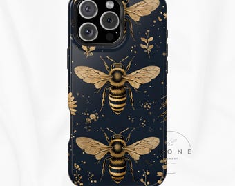 May include: A dark navy blue smartphone case featuring a repeating pattern of golden honeybees and small botanical sprigs. The design includes scattered gold speckles across the surface, with a camera cutout at the top left corner.