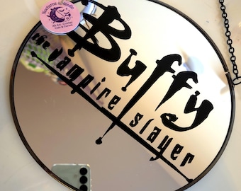Buffy the vampire slayer inspired hanging decorative mirror with chain detail.
