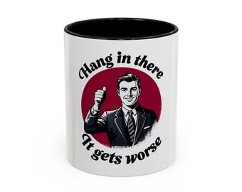 Grappige motiverende koffiemok: "Hang in There" - kantoorhumorcadeau