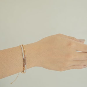 Golden Beaded Bracelet in Ash Grey