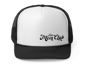 May include: A black and white trucker hat with the text "Twin Mom Club" in black script. The hat features a white front panel, a black brim, and a black mesh back.