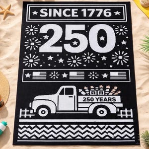 May include: Black and white decorative mat with the text "SINCE 1776" and "250". Features a truck graphic with "250 YEARS" in the truck bed, along with American flags and starburst designs. The mat has a zigzag border.