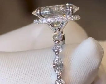 Anillo de compromiso de moissanita de corte ovalado de 3 quilates, elegante anillo de oro blanco con marquesa lateral y diamante redondo. Anillo de bodas ovalado para ella.