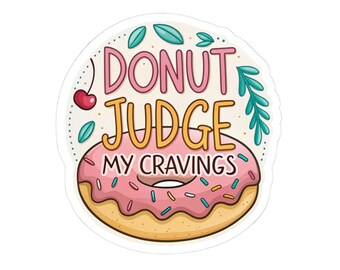 May include: A sticker with a cartoon donut design. The donut has pink icing and sprinkles. The text "DONUT JUDGE MY CRAVINGS" is written above the donut in pink and yellow, with leaves and a cherry.