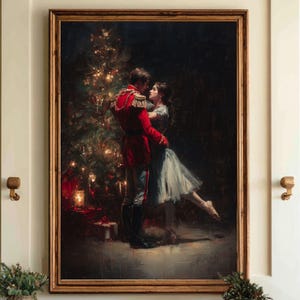 May include: A framed painting shows a couple embracing near a Christmas tree. The man is in a red military jacket, and the woman wears a light blue dress. The artwork has a warm, romantic feel, with soft lighting and a classic aesthetic.