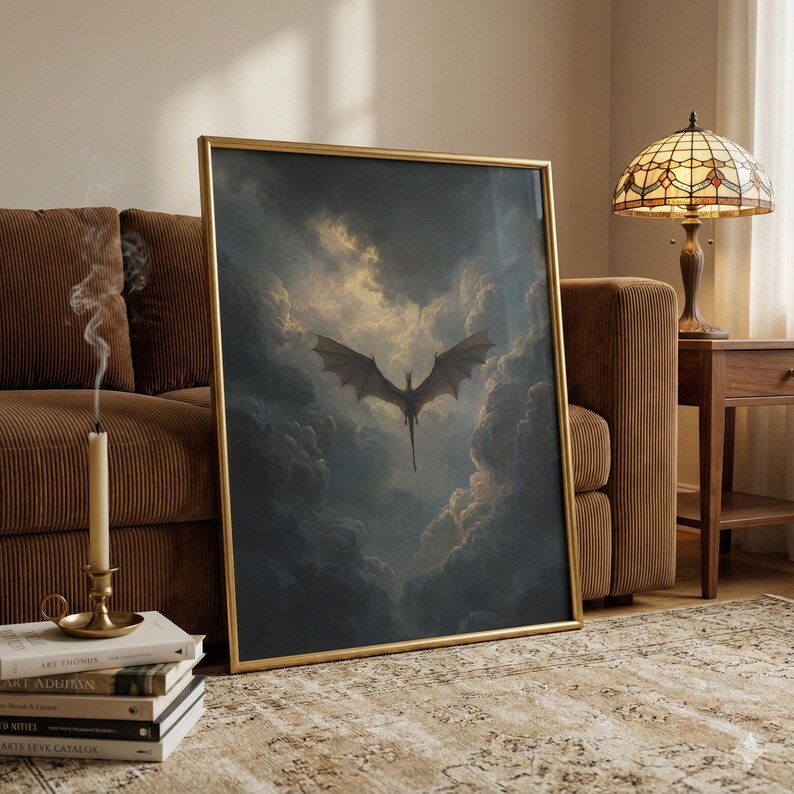 May include: A framed art print depicting a dragon in flight amidst a dramatic, cloudy sky. The dragon is dark, with outstretched wings, set against swirling grey and gold clouds. The frame is gold.