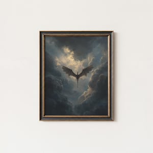 May include: Framed artwork depicting a dragon in flight amidst a dramatic, cloudy sky. The dragon is a silhouette against a bright, golden light, with dark, ominous clouds. The frame is dark with gold detailing.