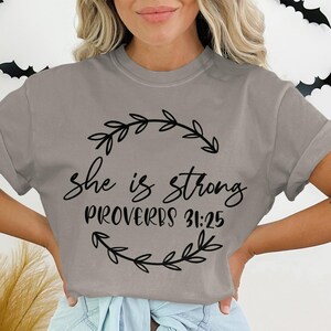 She is Strong Proverbs 31 25 T-Shirt, Inspirational Women Tee, Christian Clothing, Religious Gift, Faith Based Shirt, Floral Design