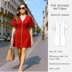 Könnte beinhalten: Eine Frau in einem roten Kleid mit goldenem Reißverschluss geht auf einer Stadtstraße. Das Kleid hat kurze Ärmel und einen V-Ausschnitt. Das Bild zeigt auch ein PDF-Schnittmuster für das Zephyr-Kleid, Größen XS-XXL.