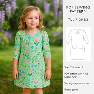 May include: A little girl wearing a green dress with a floral tulip pattern. The dress has three-quarter sleeves and two front pockets. The image also includes a PDF sewing pattern for a tulip dress, with sizes for children aged 2-6 years old.